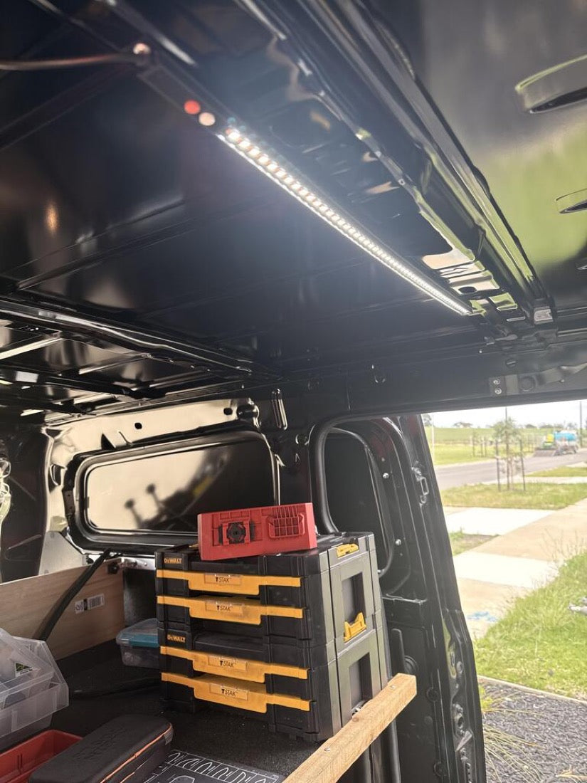 Working out of a dark truck cap