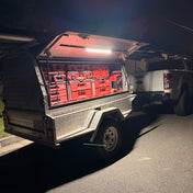 Truck and trailer lit up by LumoLux